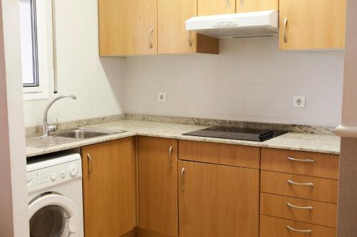 Foto de una habitación de Apartamentos Las Dunas-B