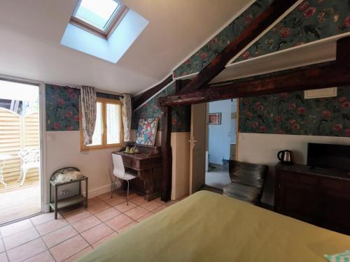 Foto de una habitación de Le Coin des Artistes