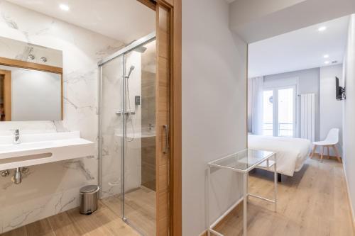 Foto de una habitación de EightRooms La Rioja Pension