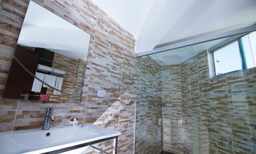 Foto del baño de Apart Hotel Regina
