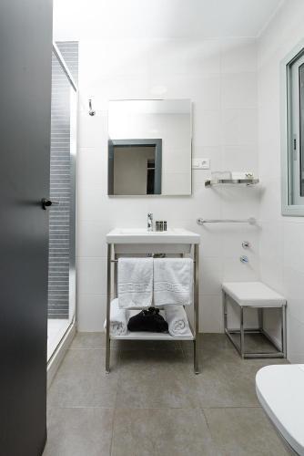 Foto del baño de Elite Hotel - Gay Men Only