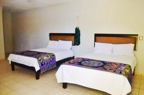 Foto de una habitación de Hotel Kinich Ahau