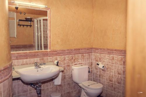 Foto de una habitación de APARTAMENTOS LA JACOBA.