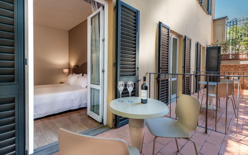 Foto de una habitación de Hotel La Fortezza