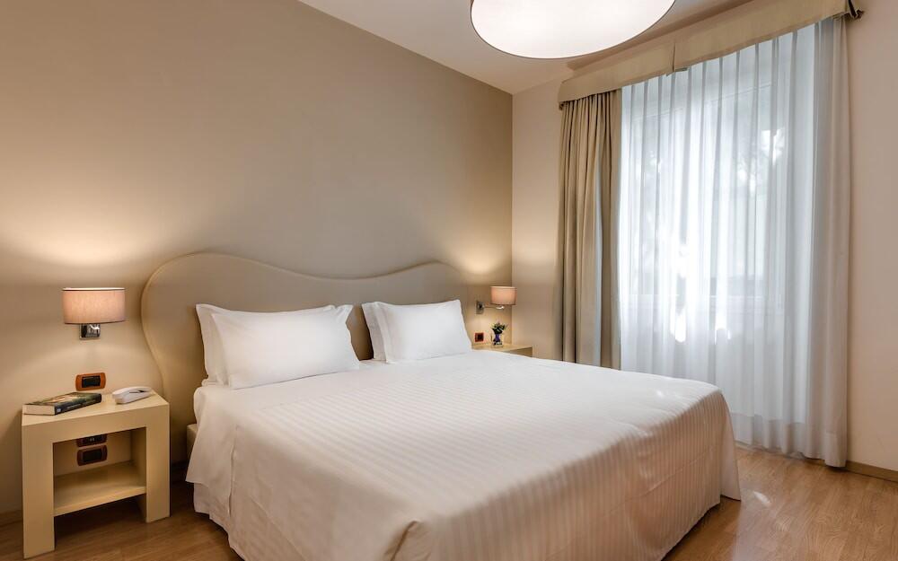 Foto de una habitación de Hotel La Fortezza