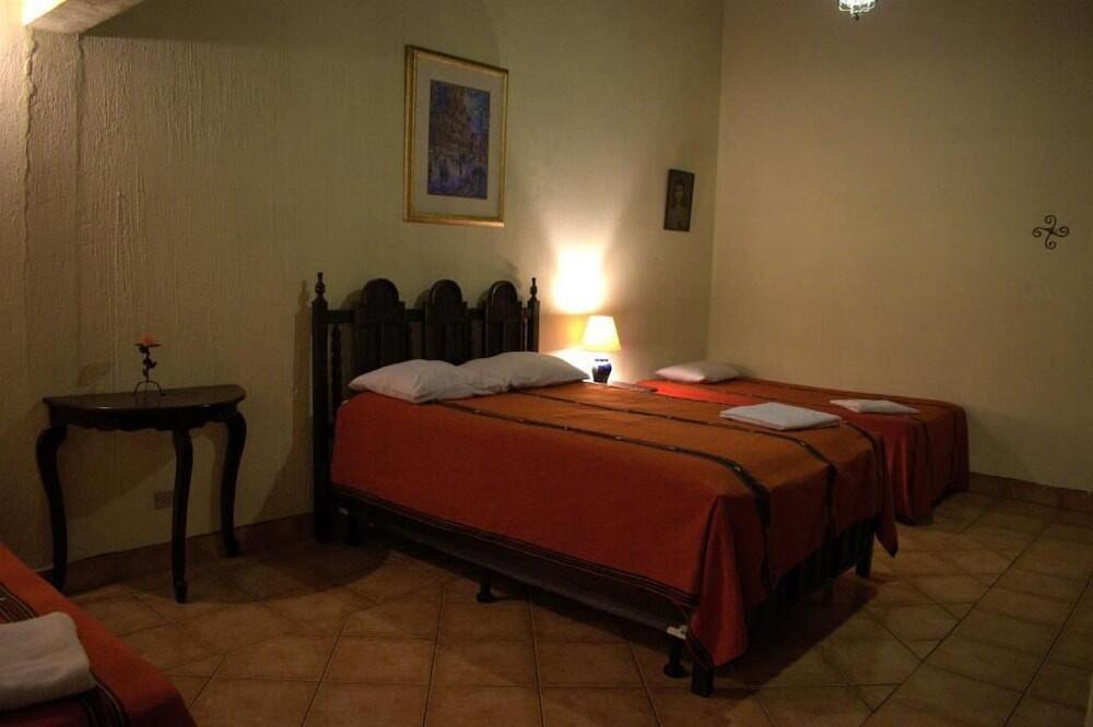Foto de una habitación de Hotel Posada Don Valentino