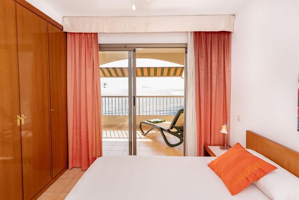 Foto de una habitación de Apartamentos María Cristina Beach