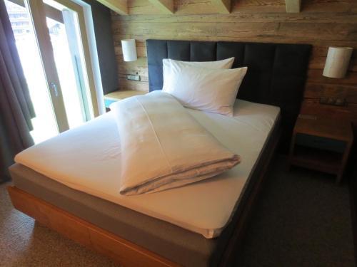 Foto de una habitación de Valluga Hotel