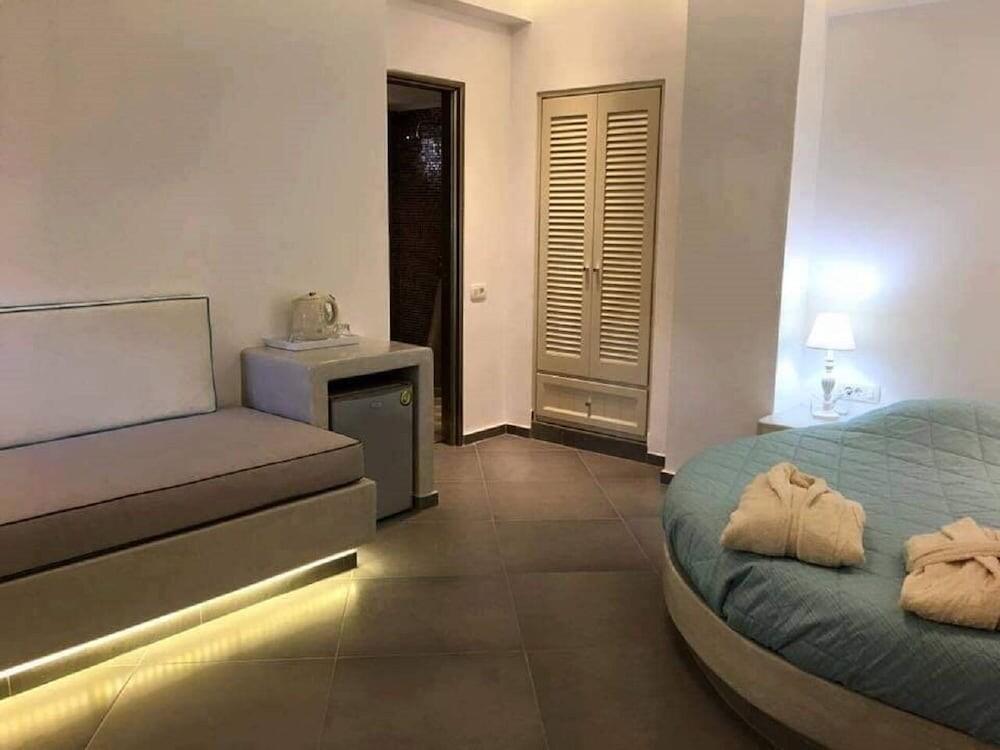 Foto de una habitación de Suites Blue Hotel