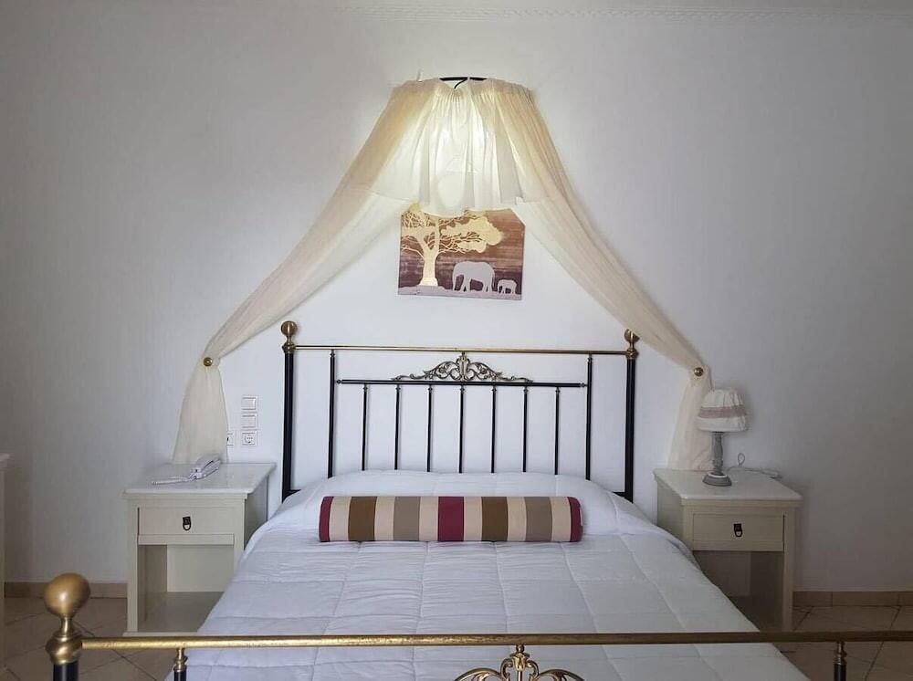 Foto de una habitación de Suites Blue Hotel