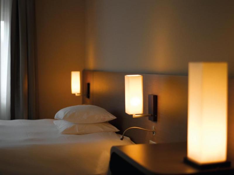 Foto de una habitación de Hotel Logis La Source Des Sens