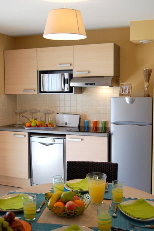 Foto de una habitación de Lagrange Grand Bleu Vacances – Résidence Le Mas de Torreilles