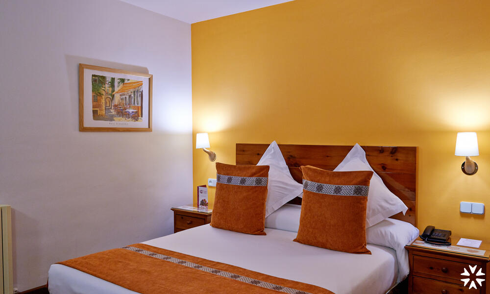 Foto de una habitación de Hotel Apartamentos Vilagaros