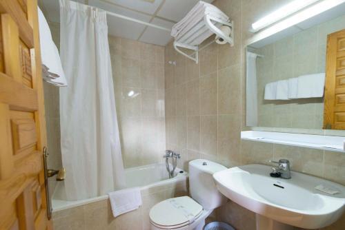 Foto del baño de Apartamentos Midi