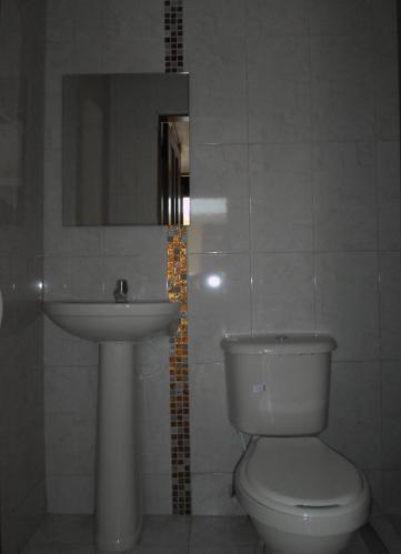 Foto del baño de Hotel Colonial Inn