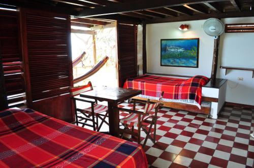 Foto de una habitación de Hotel Isla Del Pirata