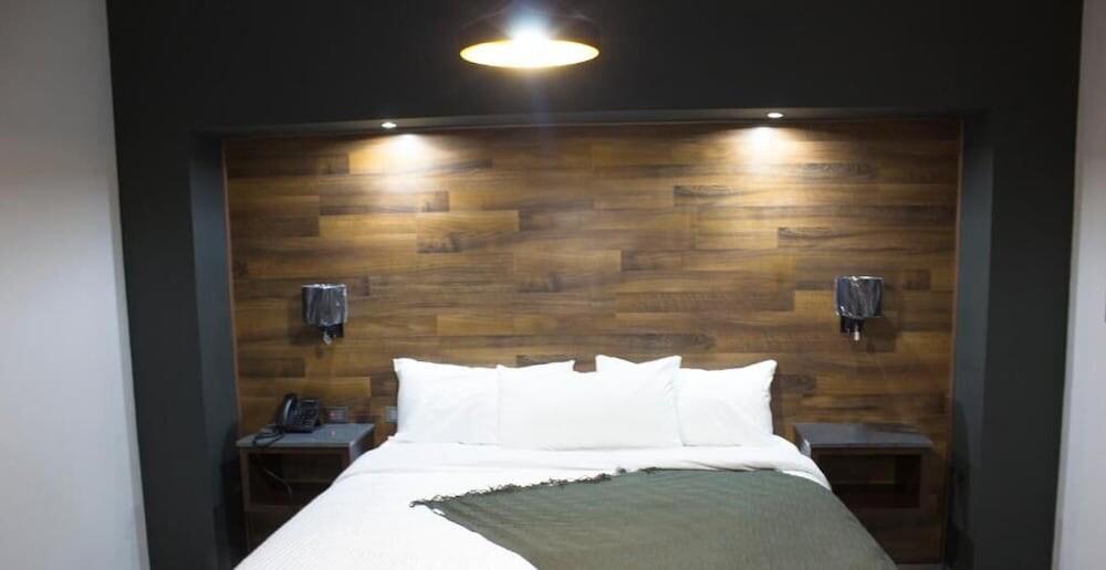 Foto de una habitación de Hotel Grand Marques