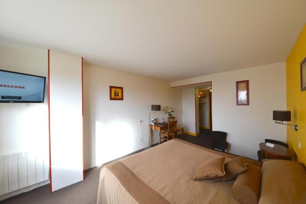 Foto de una habitación de Hotel Bomotel