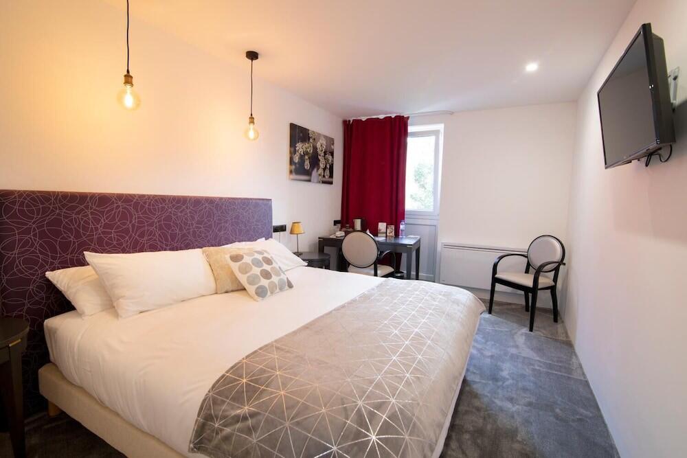 Foto de una habitación de Hotel Bomotel