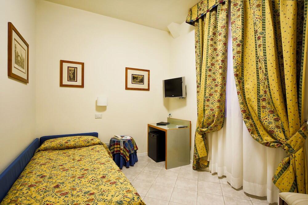 Foto de una habitación de Hotel Italia