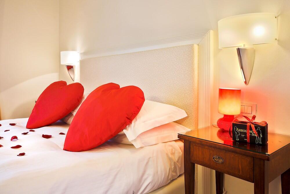 Foto de una habitación de Hotel Italia
