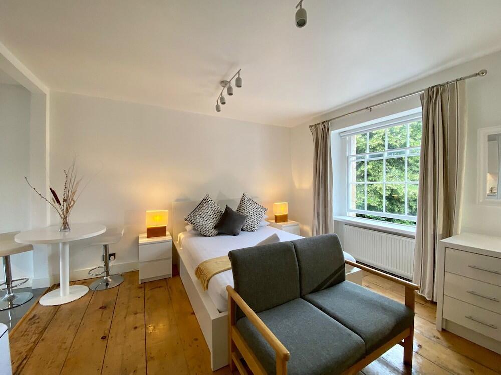 Foto de una habitación de Sun Street ApartHotel