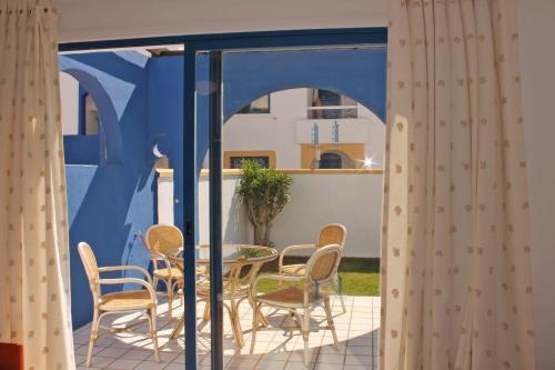 Foto de una habitación de Apartamentos El Minarete
