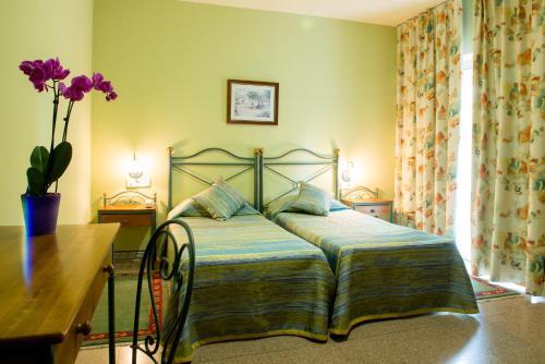Foto de una habitación de Hotel Castell Blanc