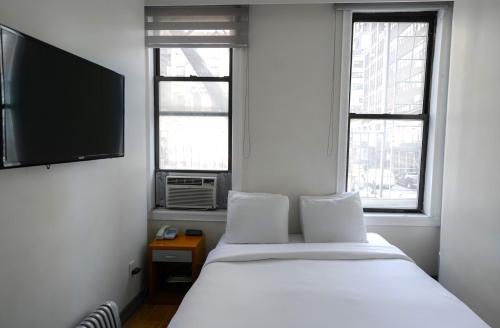 Foto de una habitación de Midtown West Hotel