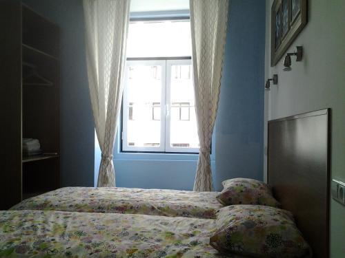 Foto de una habitación de Baixa GuestHouse