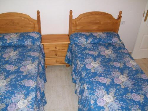 Foto de una habitación de Apartamentos Las Palmeras V.v.