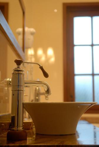 Foto del baño de Hotel Cerros