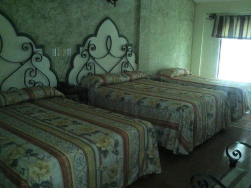Foto de una habitación de Hotel Coranda