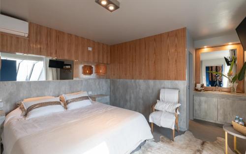 Foto de una habitación de Onas Hostel &amp;amp; Suites