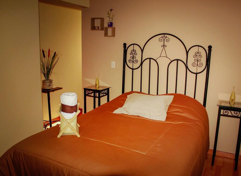 Foto de una habitación de Hotel La Mansion Del Sol
