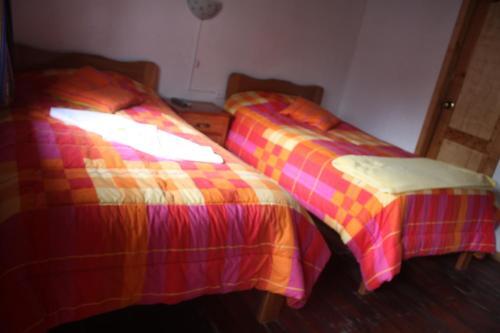 Foto de una habitación de Cabañas Los Volcanes