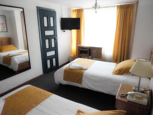 Foto de una habitación de Hotel Rincón Escandinavo