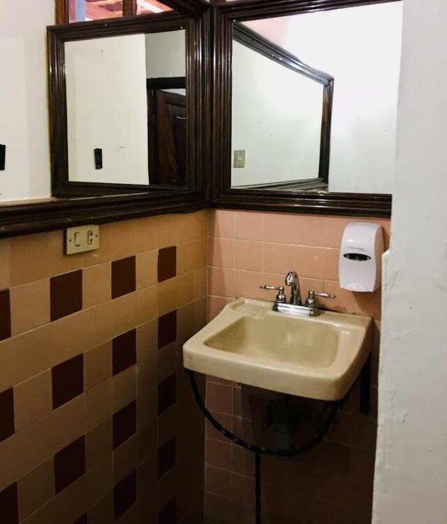 Foto del baño de Hotel Dionisio Inn