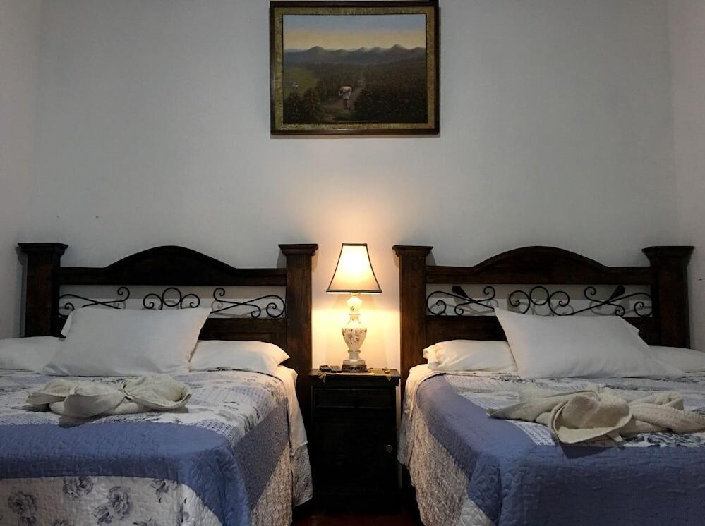 Foto de una habitación de Hotel Dionisio Inn