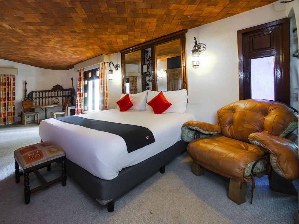 Foto de una habitación de Hotel La Mansion del Quijote