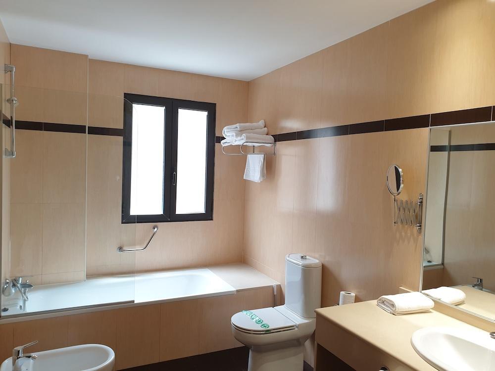 Foto del baño de Hotel Suite Camarena