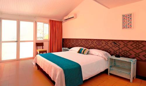 Foto de una habitación de Hotel Gimaura