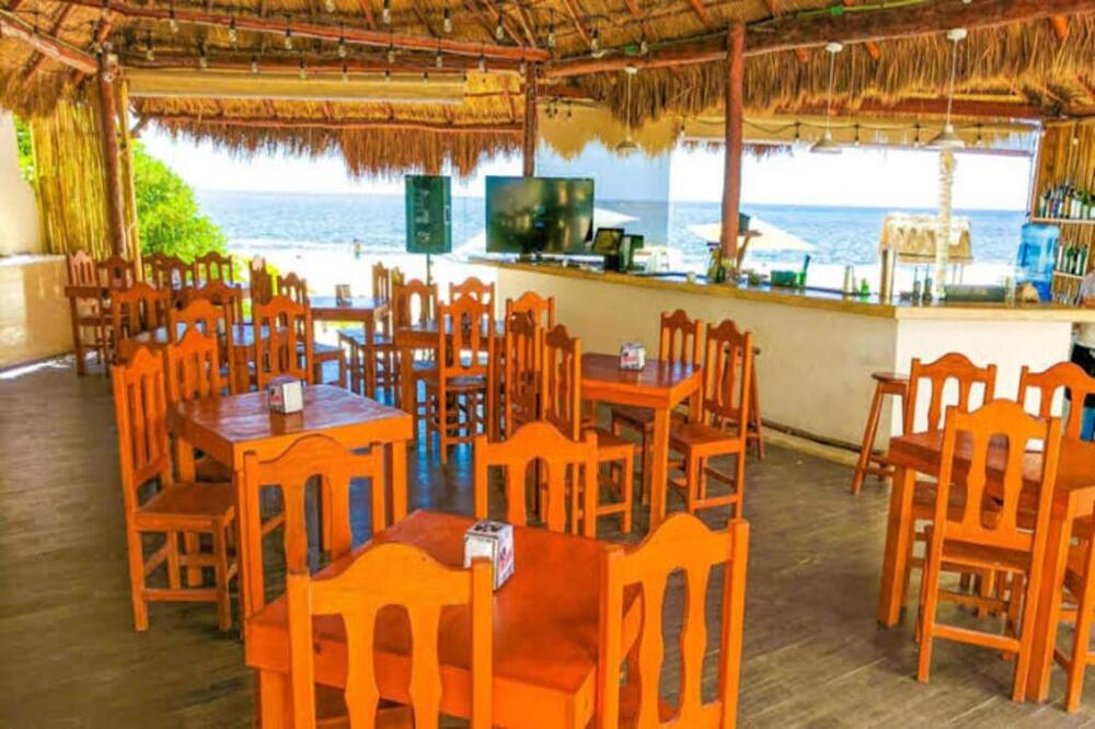 Foto de restauración de Capital O Hotel Arena Beach Club