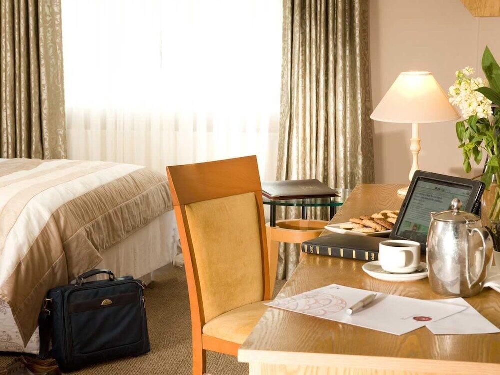 Foto de una habitación de Hotel The Commons Express Inn 