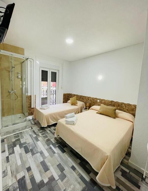 Foto de una habitación de Hostal H Noche y Dia