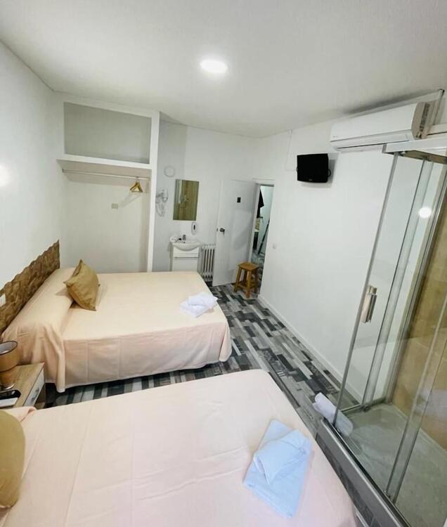 Foto de una habitación de Hostal H Noche y Dia