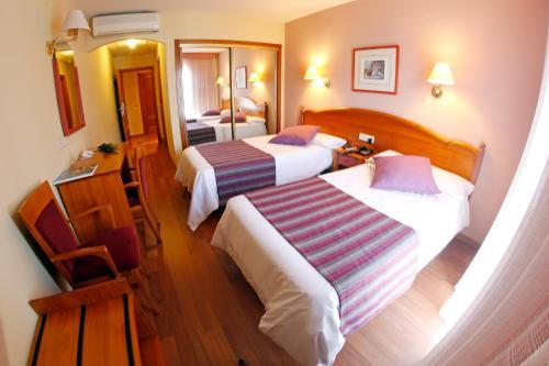 Foto de una habitación de Hotel Maria de Luna
