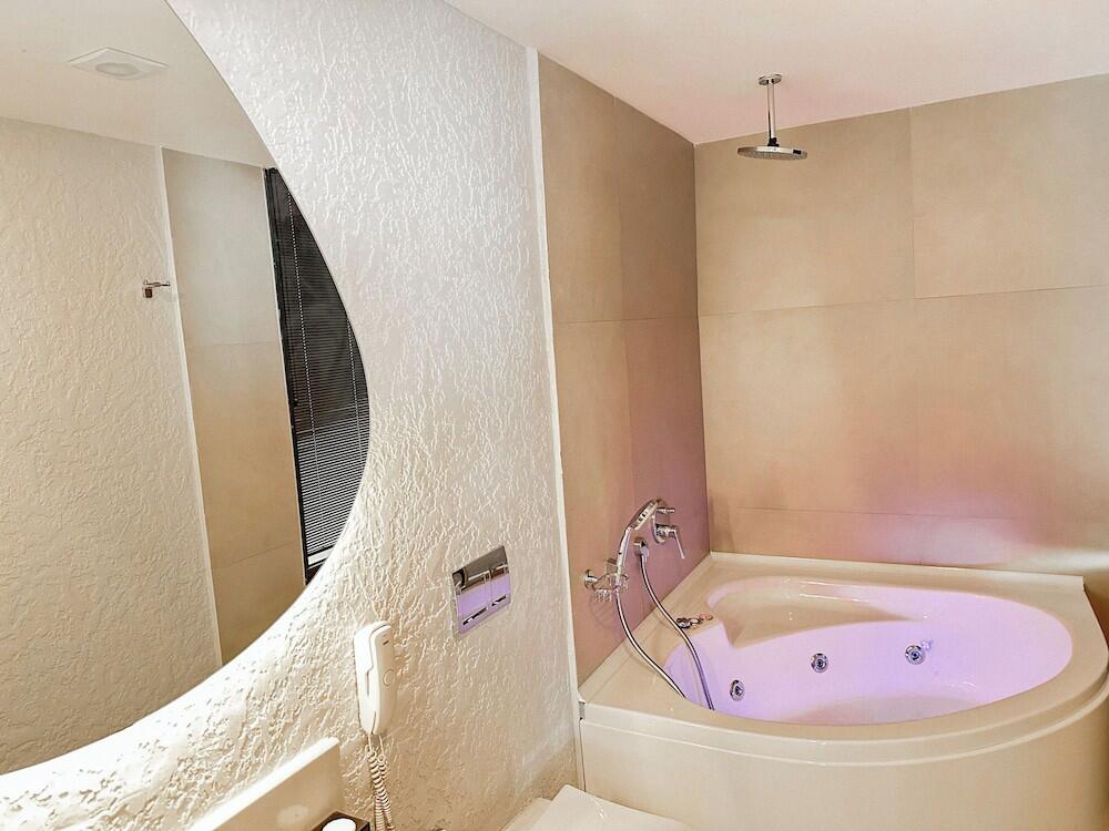 Foto del baño de Lilium Boutique Hotel