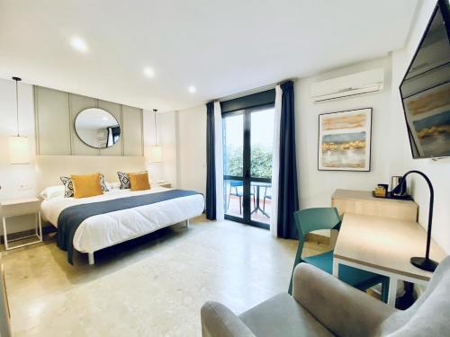 Foto de una habitación de Hotel Apartamentos Marina Luz