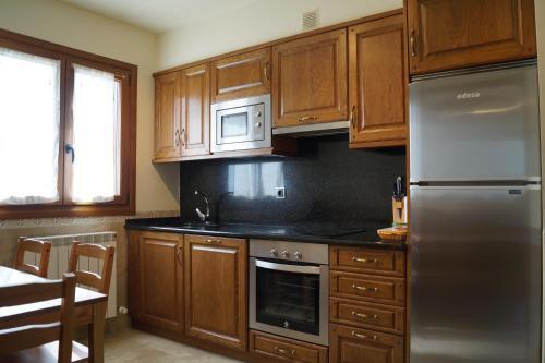 Foto de una habitación de Apartamentos Amalur Etxea - Irati